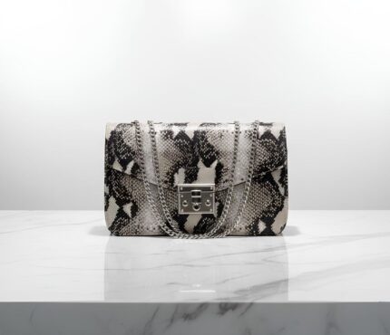 An image of a Black and White Exotic Skin Raisa Bag