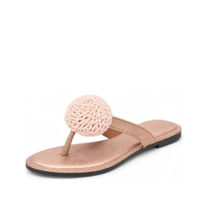 Beaded Slippers in rose-gold leather with beaded pom-pom, three-quarter view, handcrafted by Morin.O, Lagos