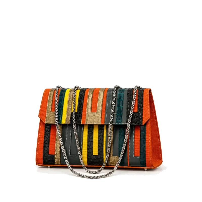 Asake Asooke bag in orange aso-oke with patchwork leather strips and chain strap, angle view