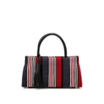 Lola Bag In Aso Oke, handcrafted leather bag by Morin.O, Lagos